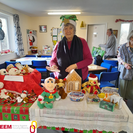 Elderly lady dressed in festive clothing at a community event at Oaklands Centre in Saltash