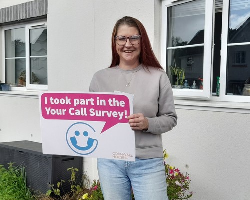 A photo of Rebecca from Launceston holding the TSM winner card