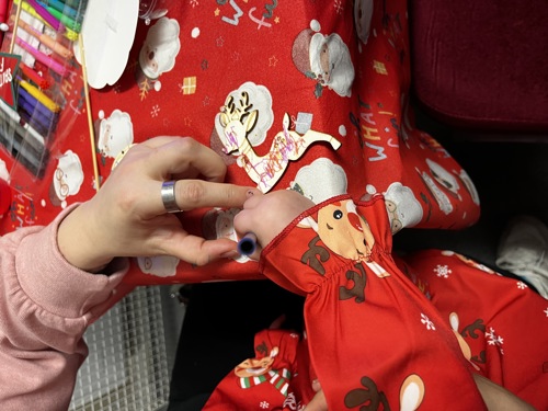 photo of child's hand colouring in