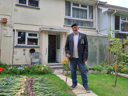Resident Derek showing his vegetable garden