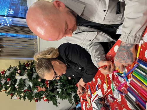 photo of Cardo employees doing crafts at a christmas event