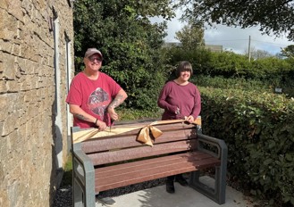 Residents cut the ribbon on the new bench outside Crow's Nest, Penzance