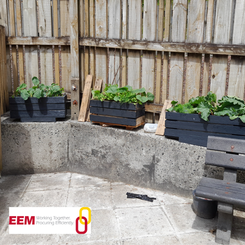 photo of flower boxes in communal garden