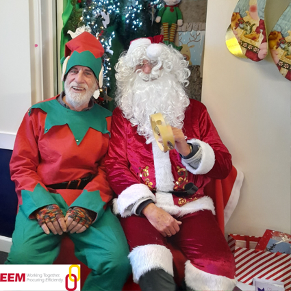Picture of Santa and an Elf attending Oakland's Community Christmas event in Saltash