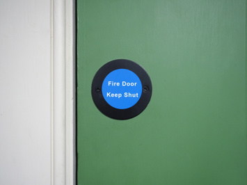 picture of a fire door sticker on a fire door